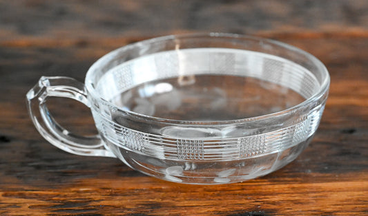 etched lines on sides of shallow bowl with handle