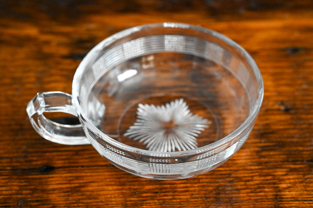 etched lines on sides of shallow bowl with handle