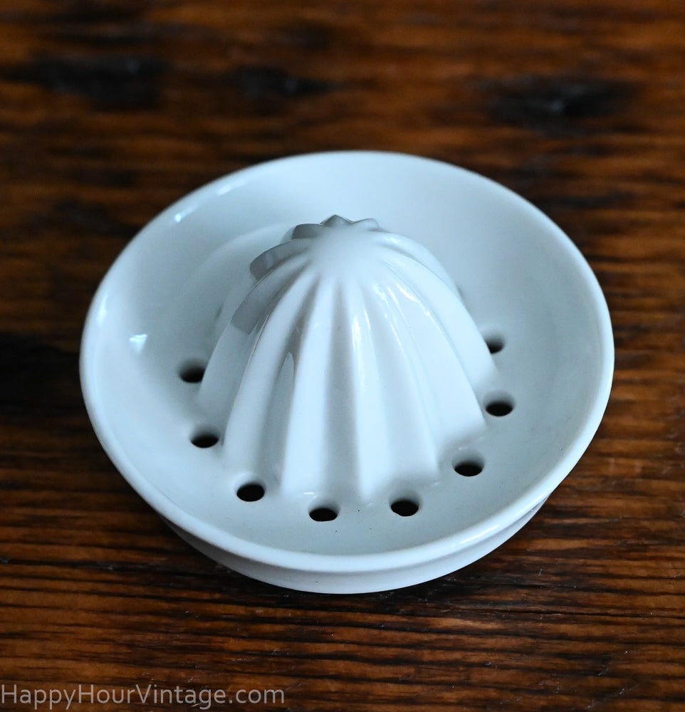 white porcelain jar top juicer