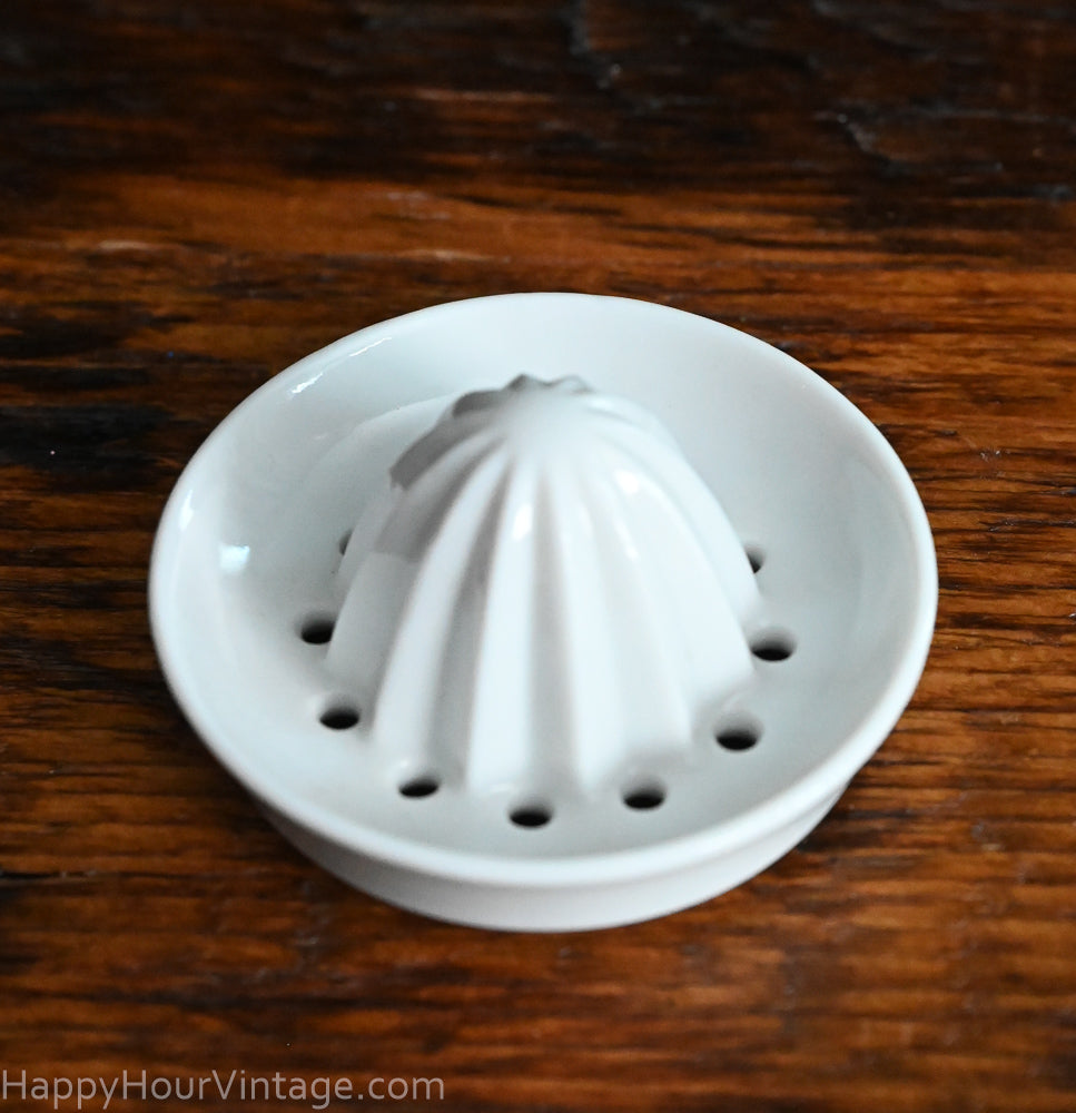 white porcelain jar top juicer