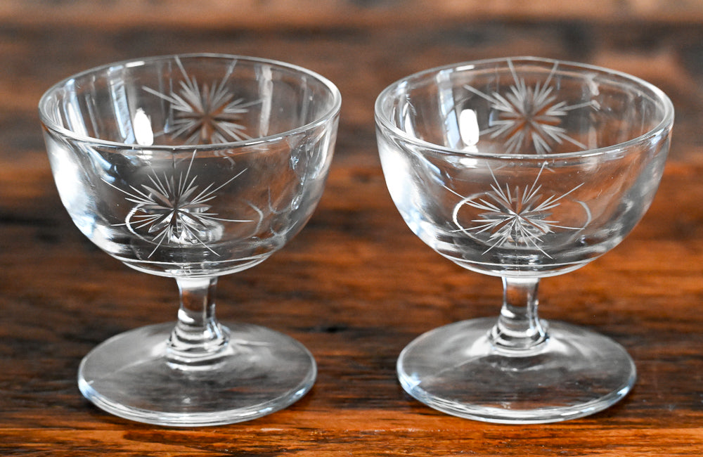 clear champagne coupes Fostoria Starburst with star etched