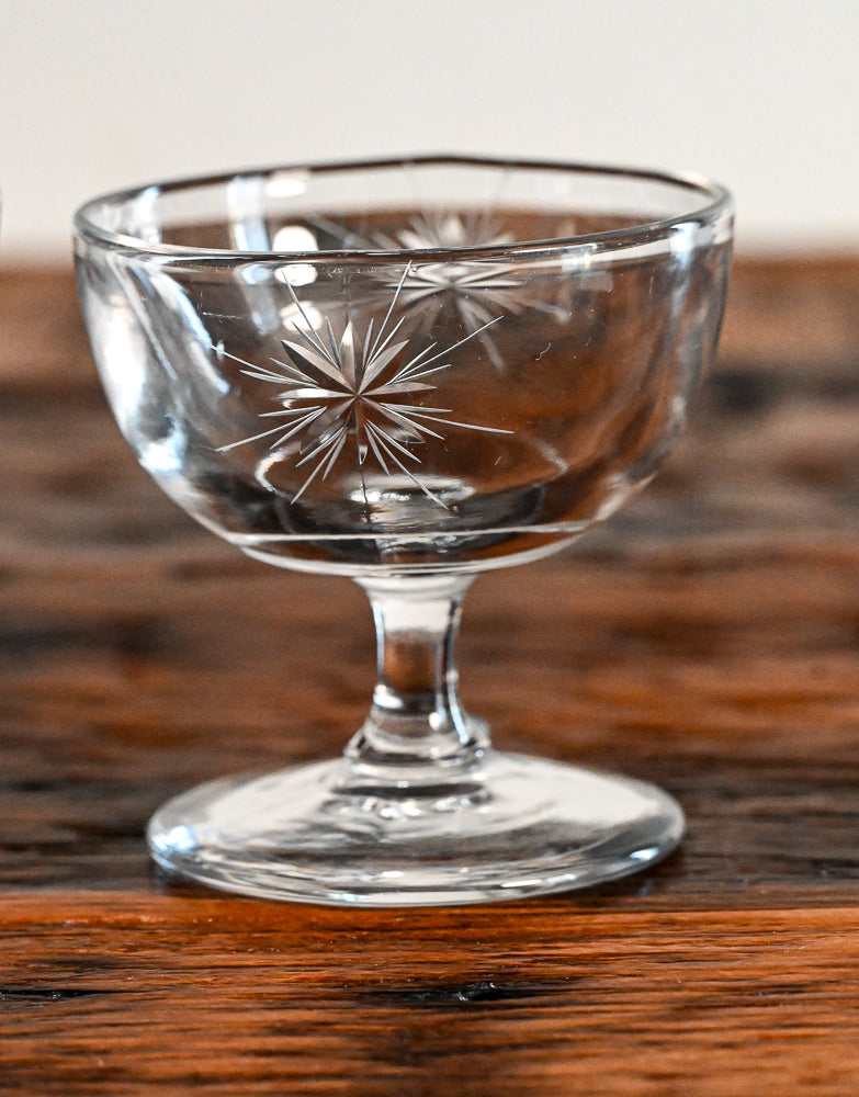 clear champagne coupes Fostoria Starburst with star etched