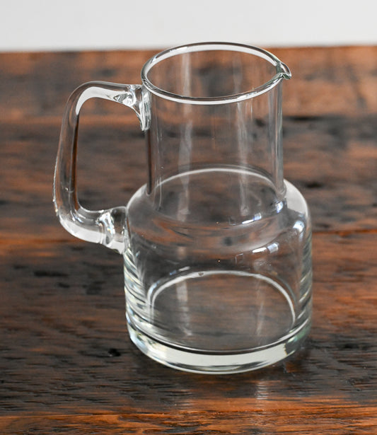 clear glass pitcher with square handle