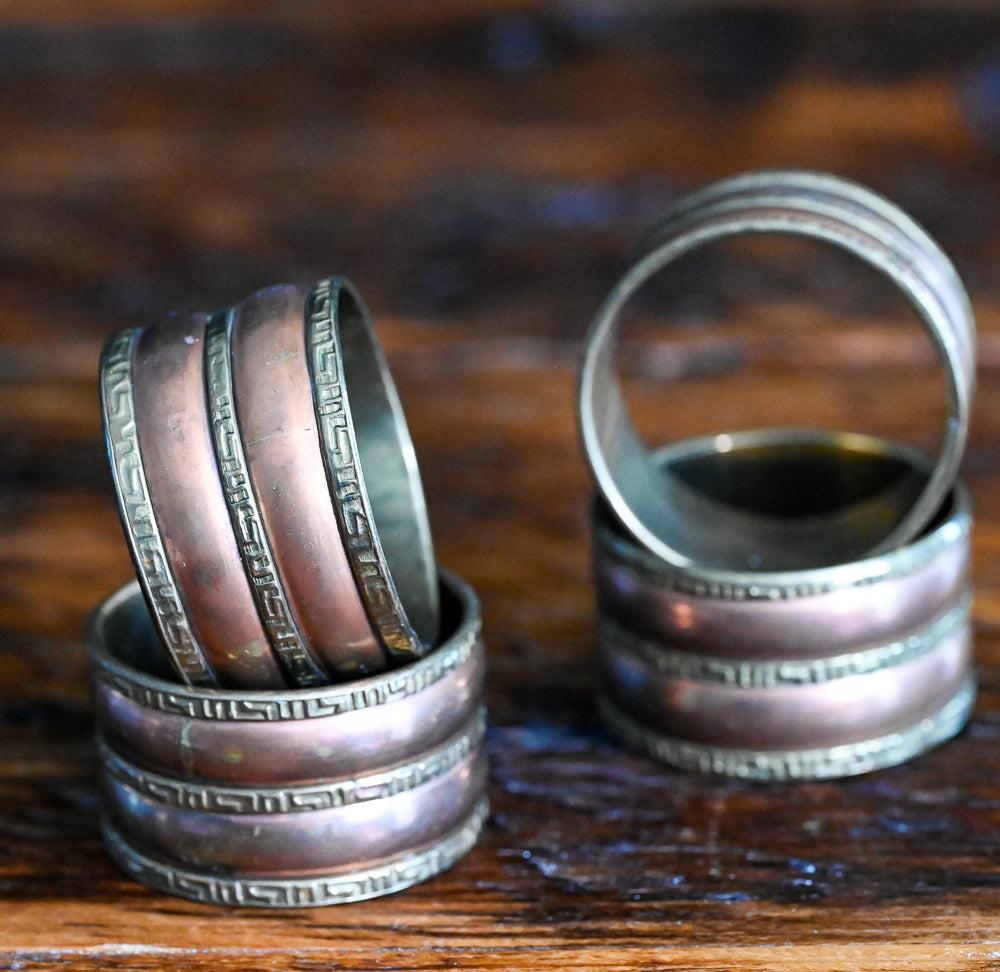 brass and copper Greek Key pattern Napkin rings