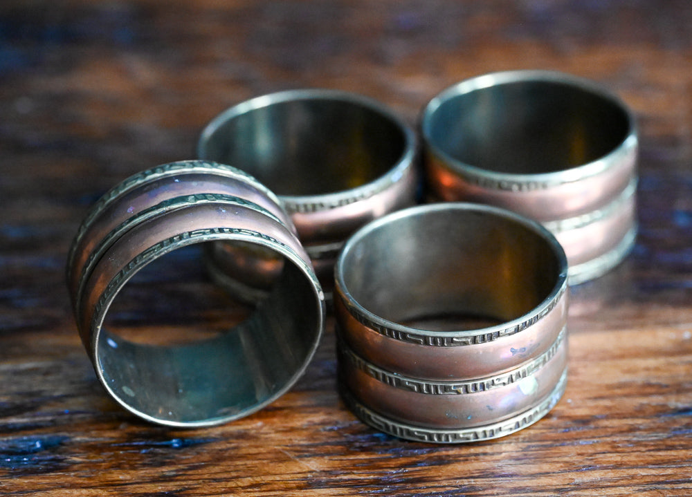 brass and copper Greek Key pattern Napkin rings