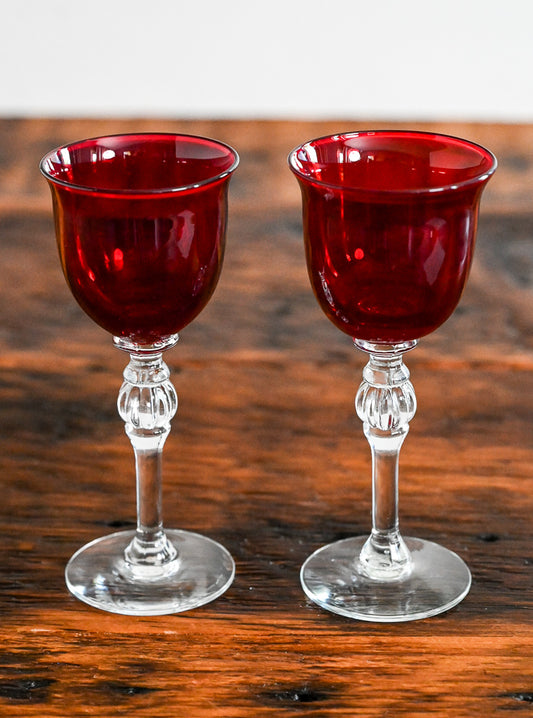 red glasses with clear stems
