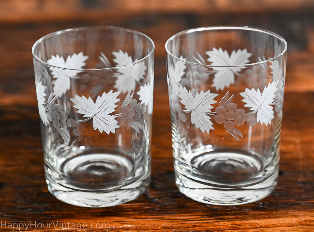 etched leaves and grapes clear rocks glasses