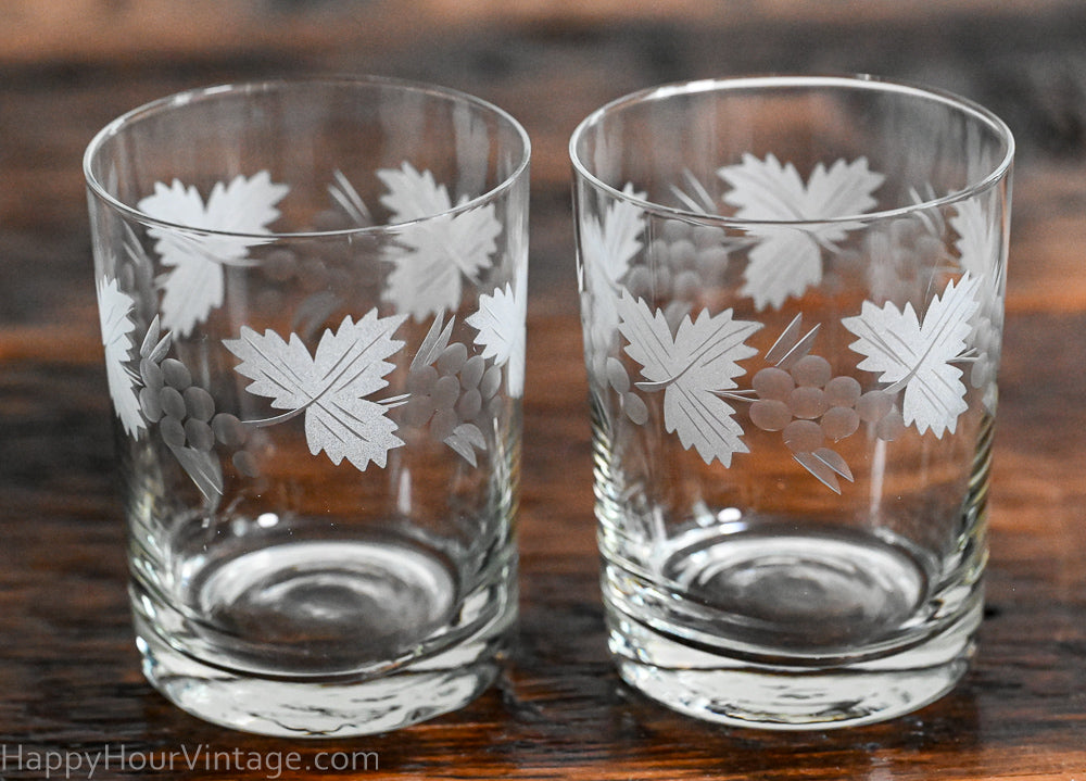 etched leaves and grapes clear rocks glasses