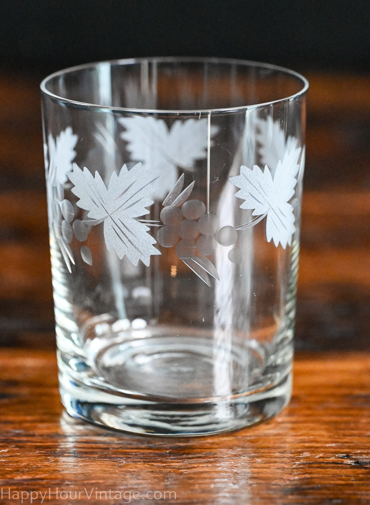 etched leaves and grapes clear rocks glasses