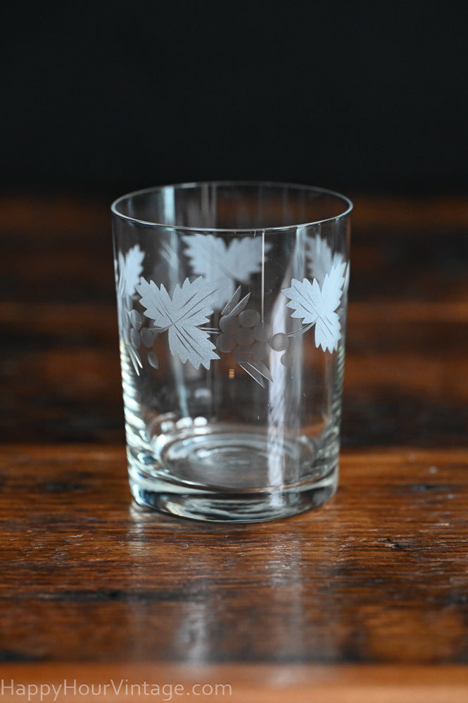 etched leaves and grapes clear rocks glasses