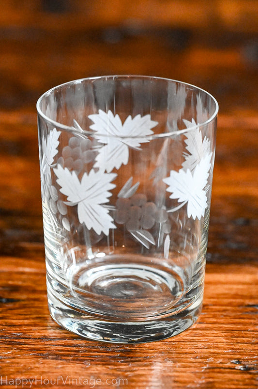 etched leaves and grapes clear rocks glasses