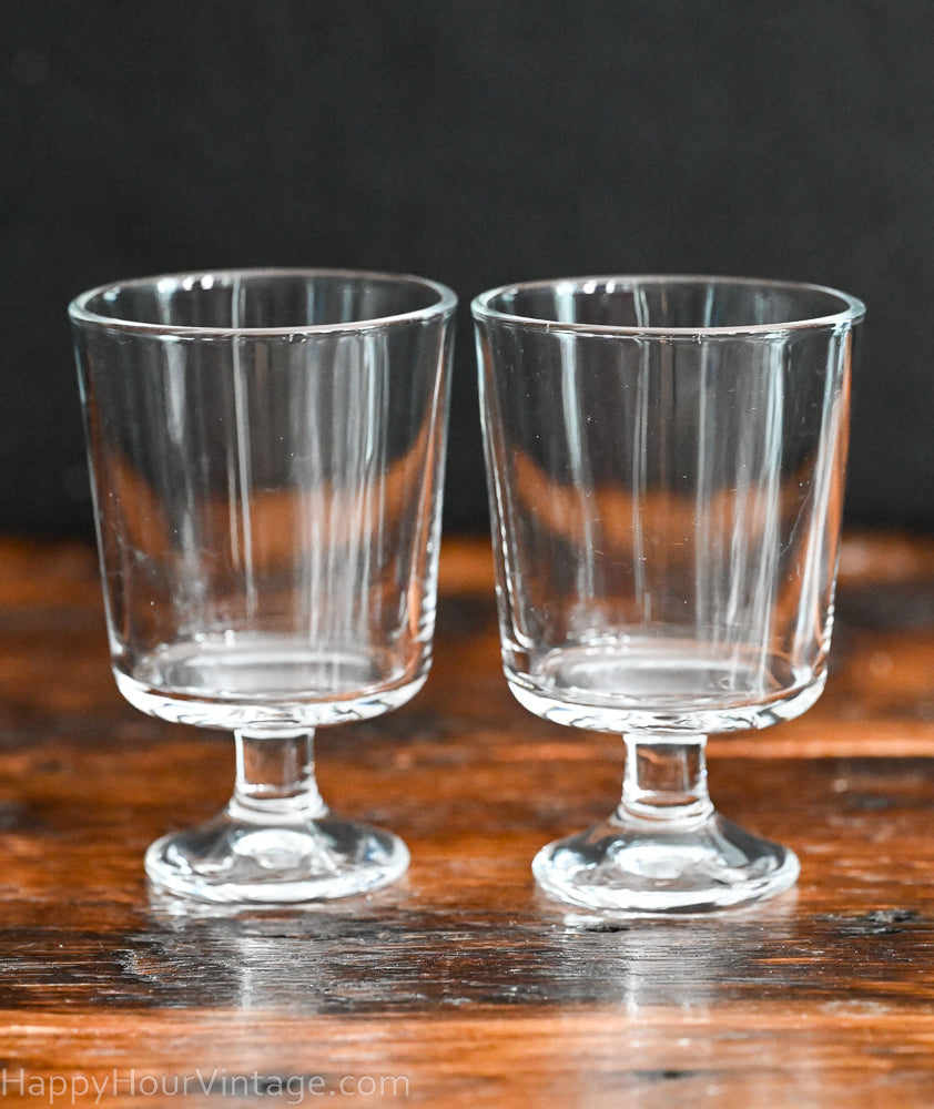 clear glass stemmed parfait or wine glasses