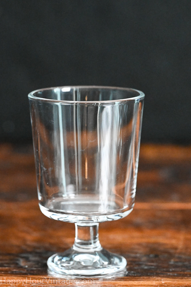 clear glass stemmed parfait or wine glasses