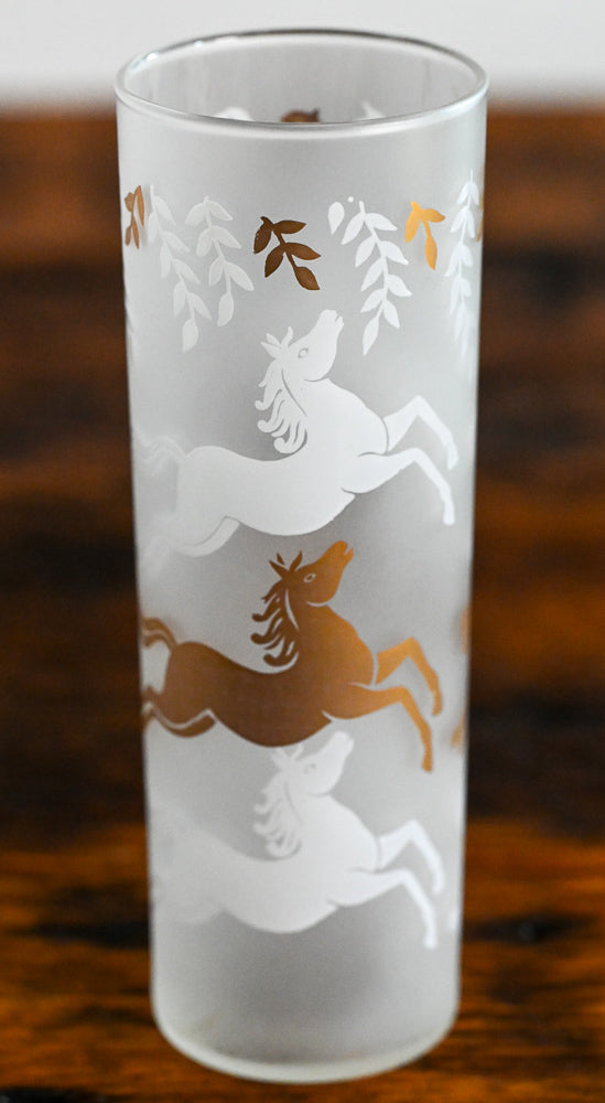 gold and white horses on frosted highball glass