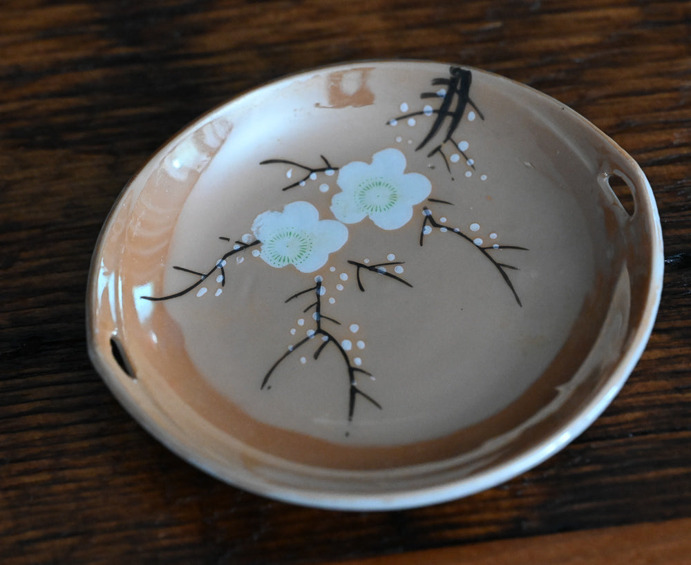 peach colored Japanese lusterware trinket dishes with white painted flowers