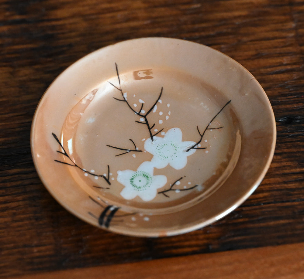 peach colored Japanese lusterware trinket dishes with white painted flowers