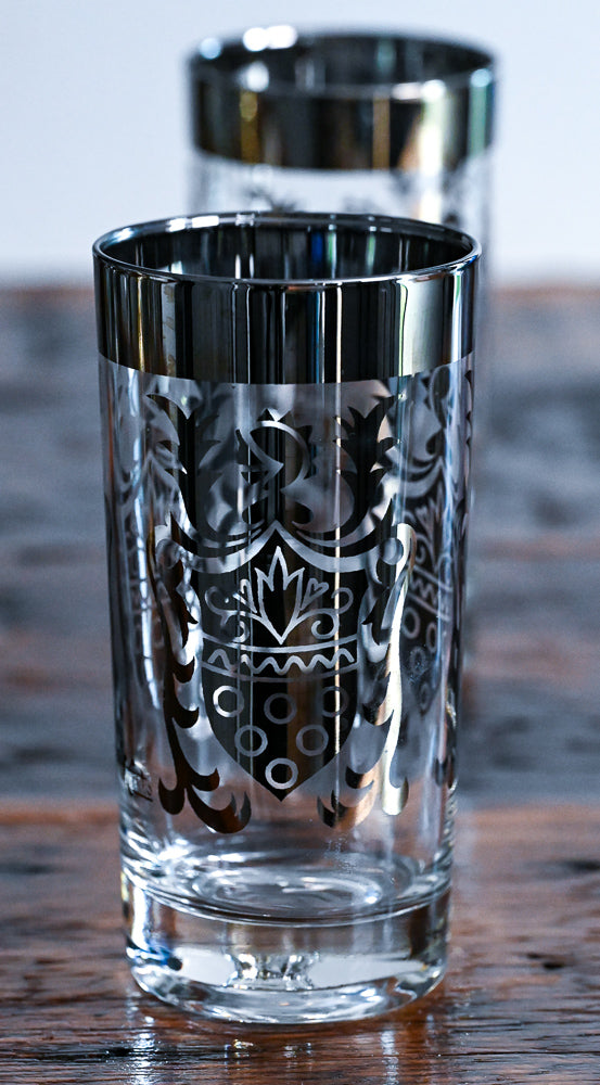 silver rimmed and coat of arms highball glasses