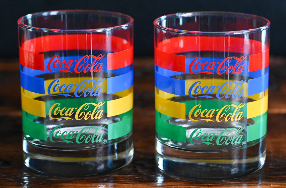 red, blue, yellow and green striped Vintage Coca-Cola double rocks glasses