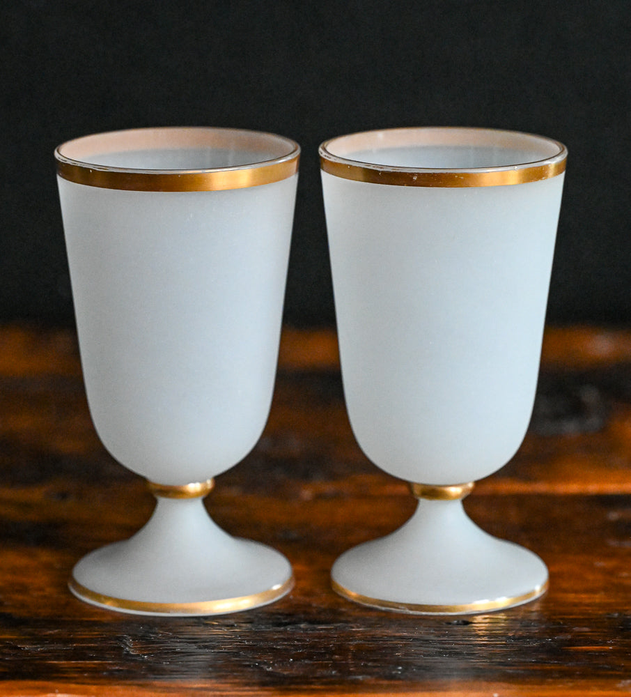 white frosted opaline goblets with gold trim and rim