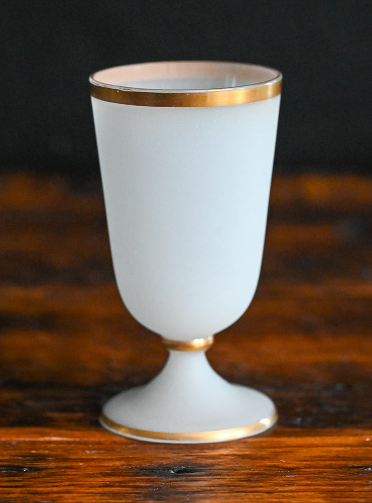 white frosted opaline goblets with gold trim and rim