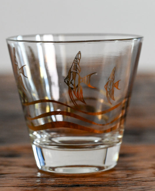 Fred Press rocks glass with gold fish and waves