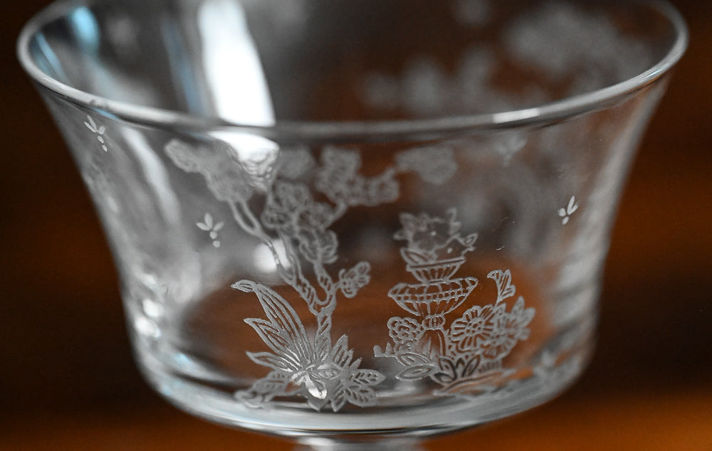 clear Fostoria Garden scene etched cocktail coupes with trees, bridges and floral