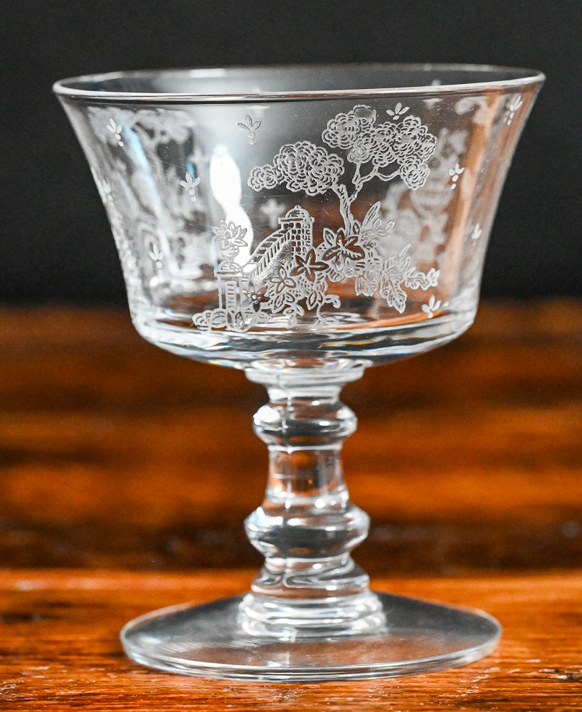 clear Fostoria Garden scene etched cocktail coupes with trees, bridges and floral