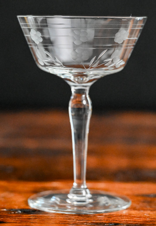 floral and line etched clear cocktail coupes