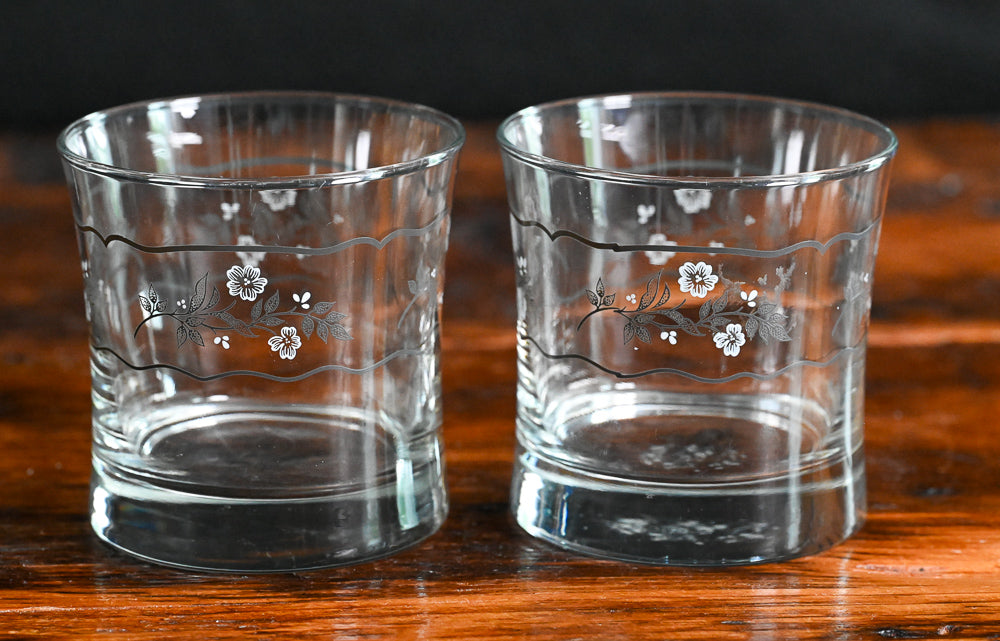 white and gray floral rocks glass