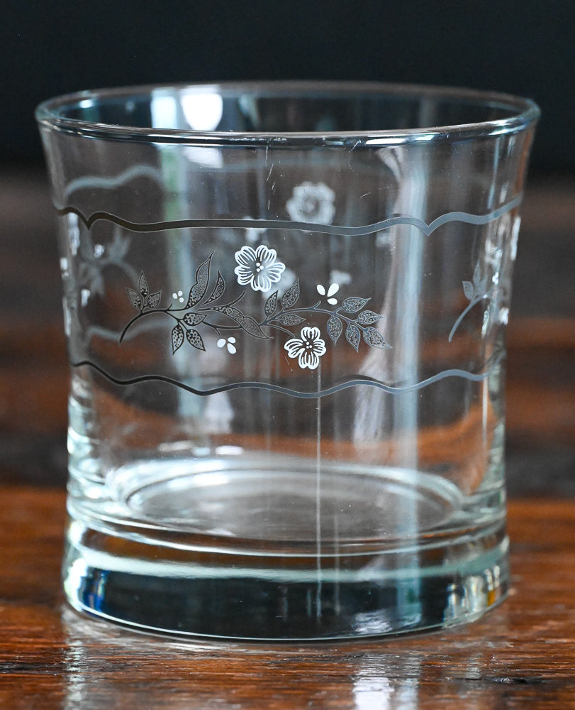white and gray floral rocks glass
