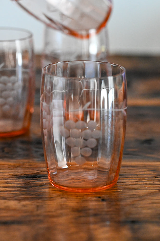 pink glass tumblers with grape etchings
