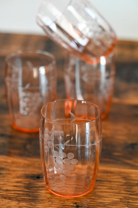 pink glass tumblers with grape etchings