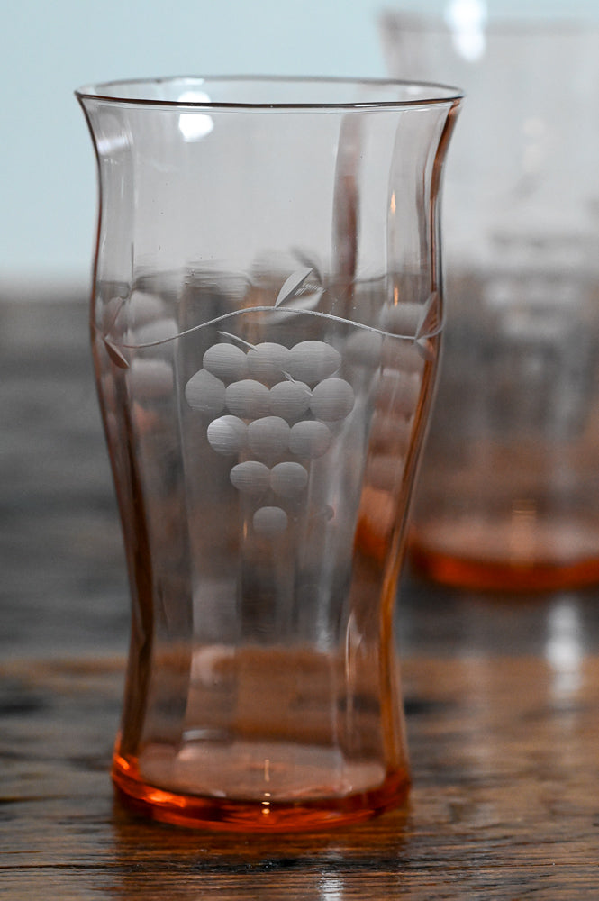 pink glass etched with grape bunches