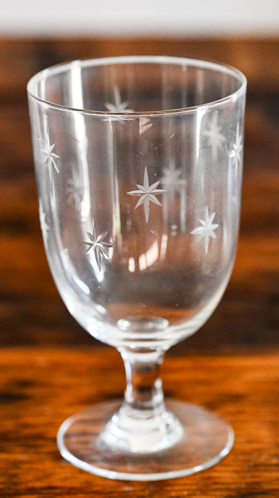 clear footed goblet with etched stars