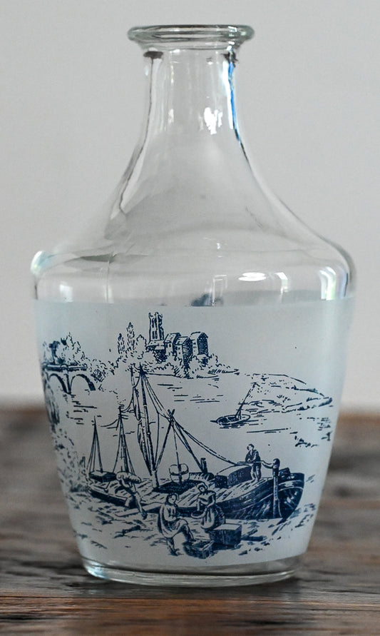 decanter with blue and white scene
