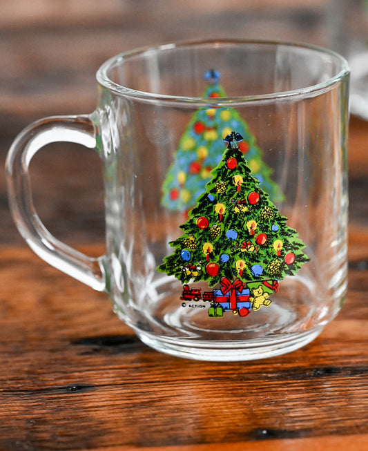 clear glass mug with christmas tree