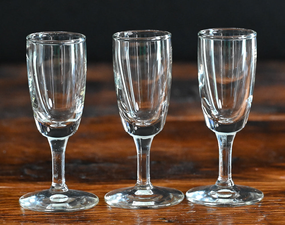3 clear cordial glasses