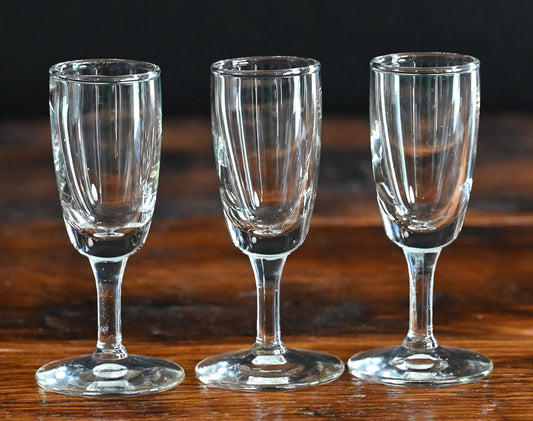 3 clear cordial glasses