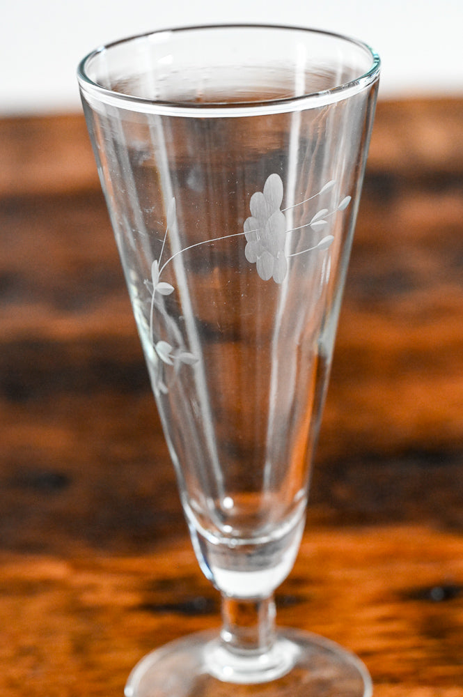 clear glass pilsner glass with floral etching