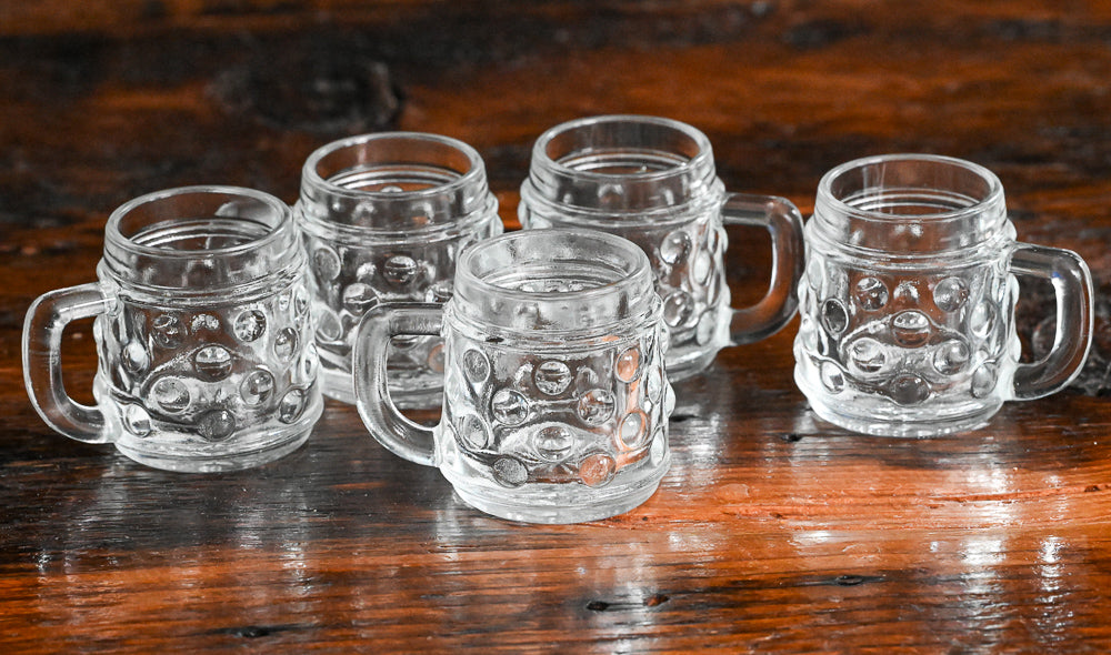 clear dimpled German mini beer mugs