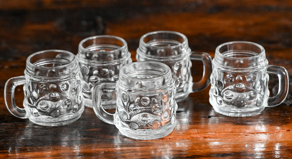 clear dimpled German mini beer mugs