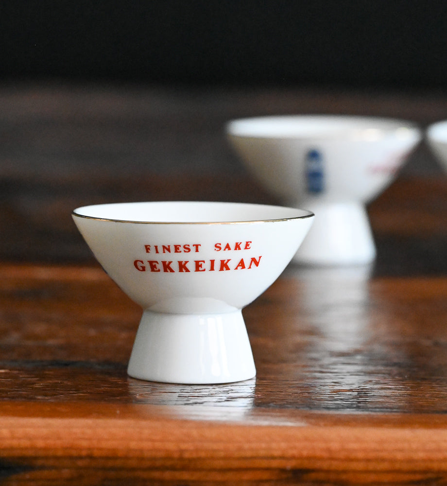 blue floral white porcelain Gekkeikan sake cups