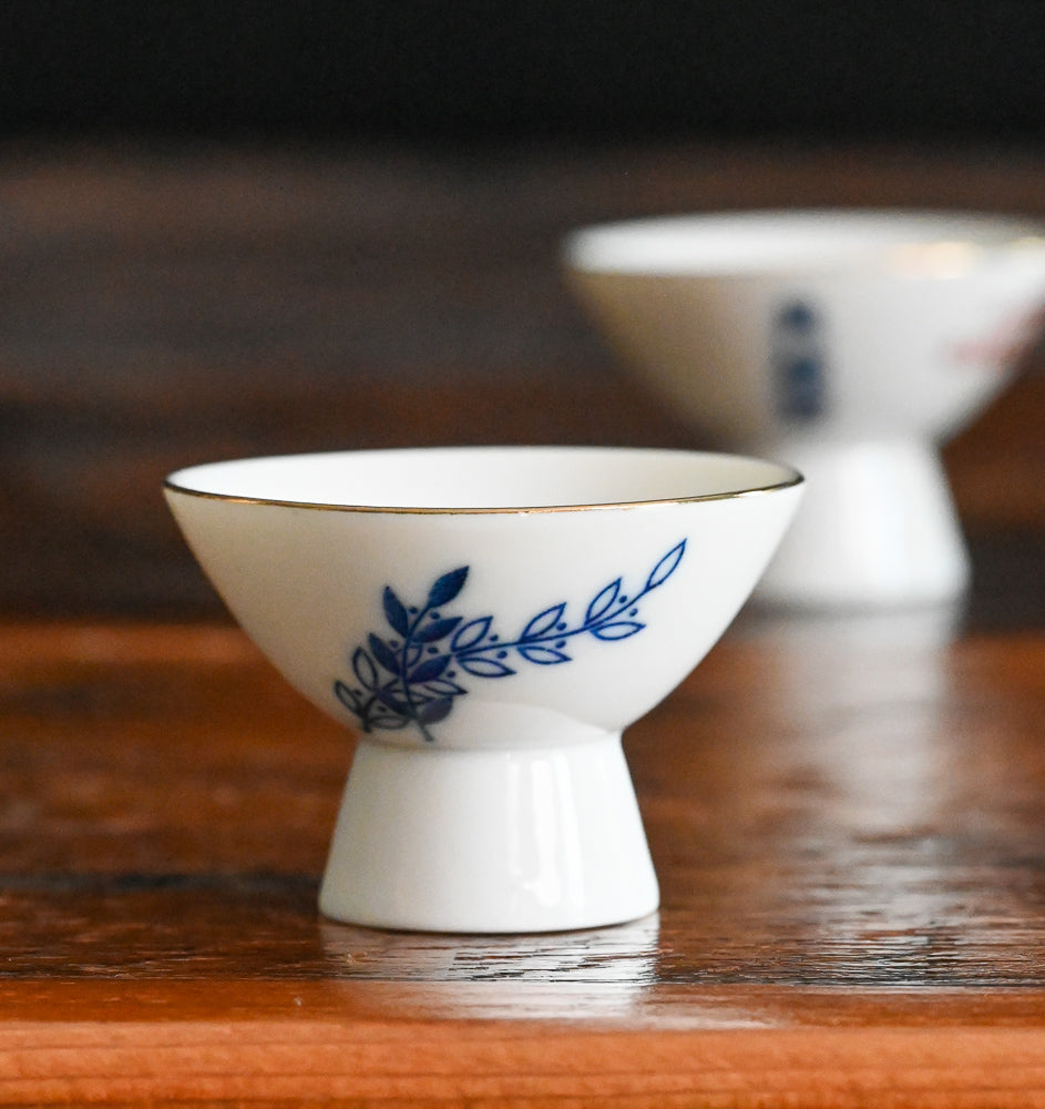 blue floral white porcelain Gekkeikan sake cups
