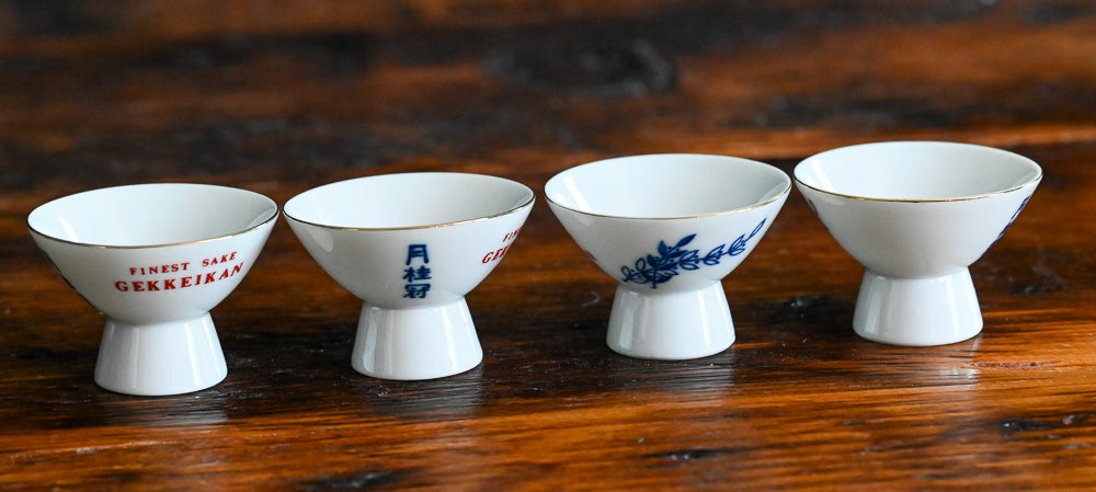 blue floral white porcelain Gekkeikan sake cups