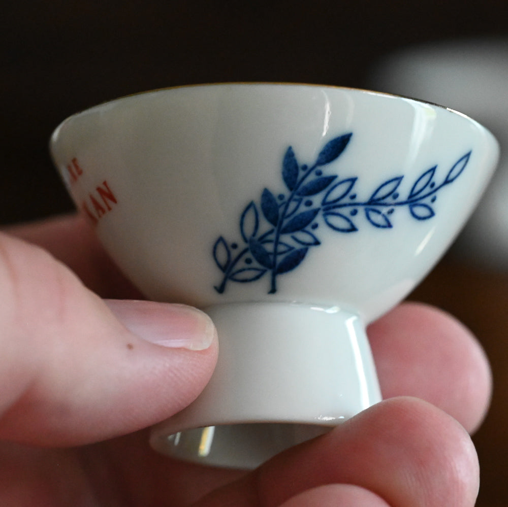 blue floral white porcelain Gekkeikan sake cups