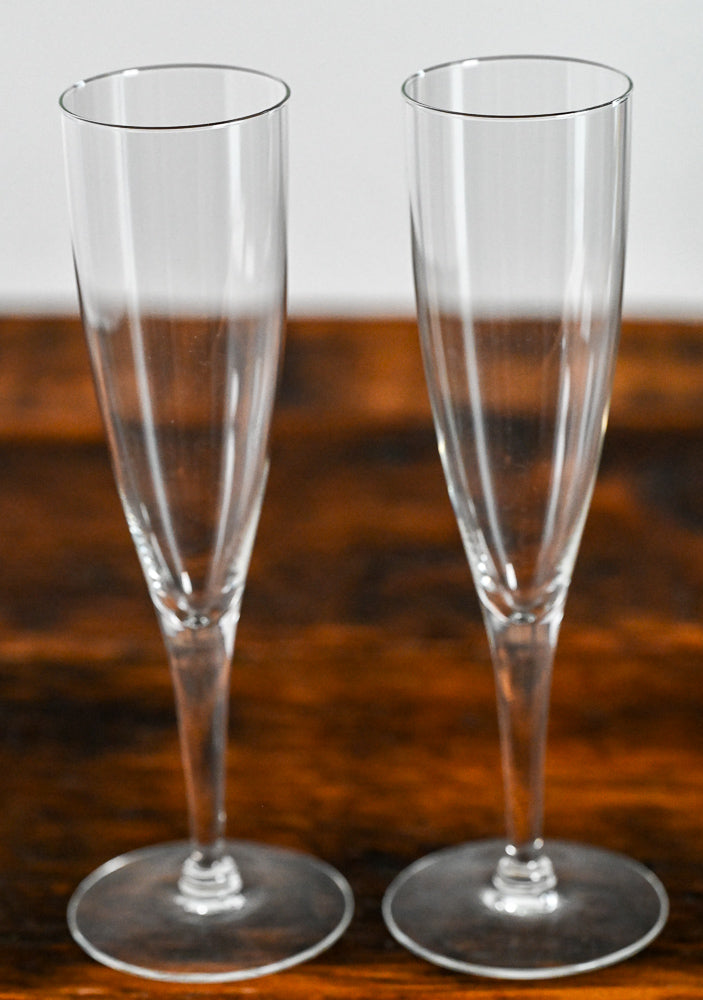 clear glass champagne flutes