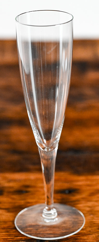 clear glass champagne flutes