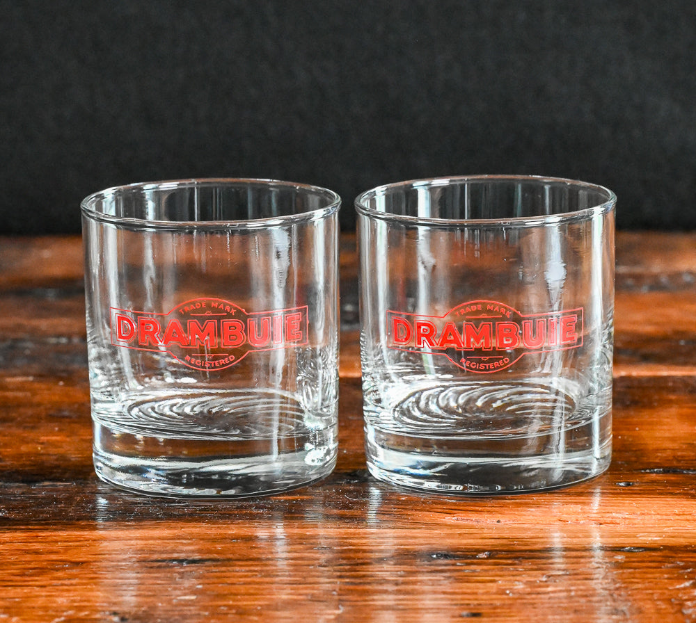 red Drambuie logo on clear rocks glasses