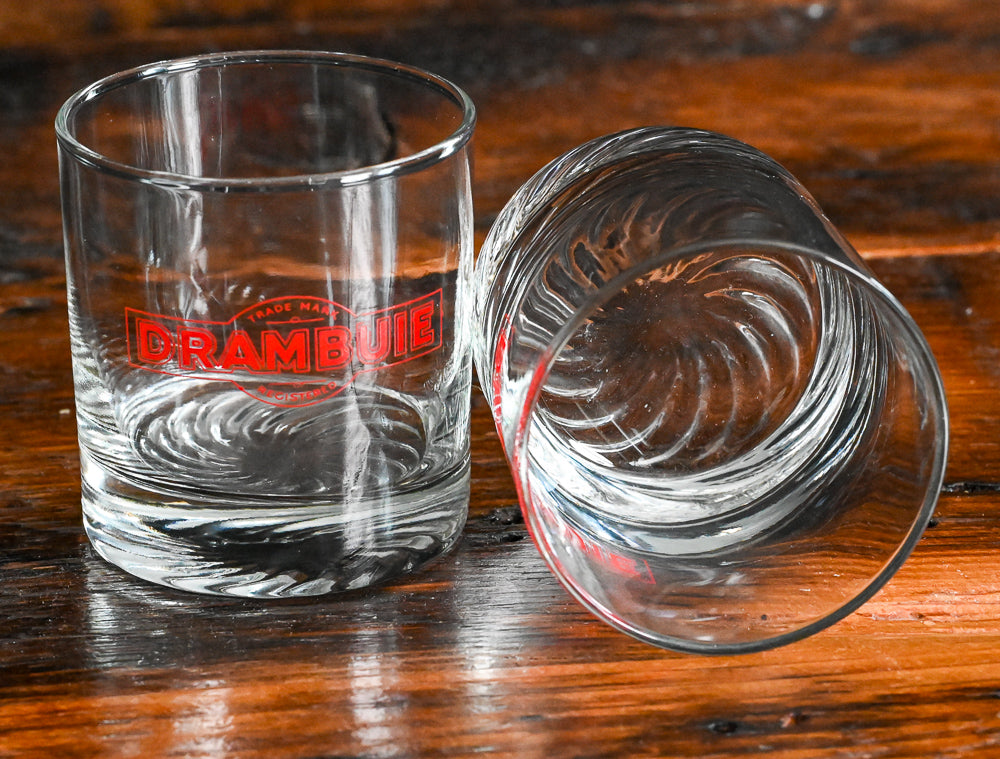 red Drambuie logo on clear rocks glasses