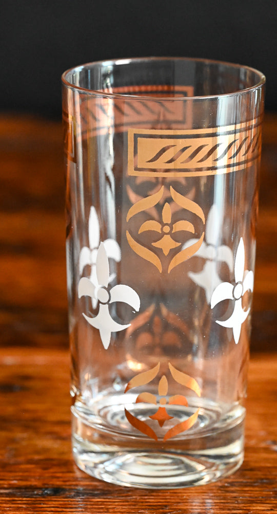 white and gold Fleur de lis print tumblers